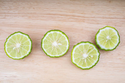 High angle view of green fruits on table