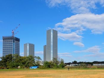 View of built structures against blue sky