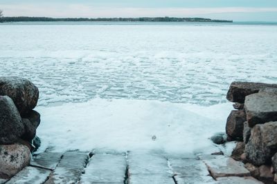 Scenic view of sea shore during winter
