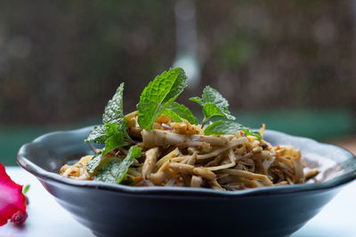 Close-up of rice in bowl on table