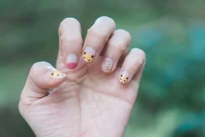 Close-up of woman holding hand