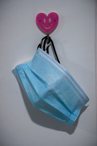 Close-up of heart shape against blue background