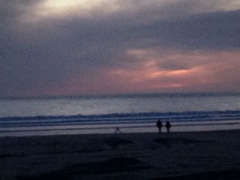 Scenic view of sea at sunset