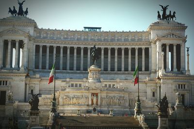 Low angle view of altare della patria against sky