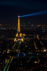 Aerial view of illuminated city at night