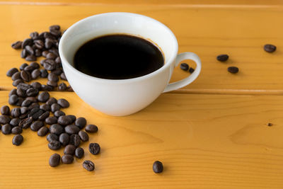 High angle view of coffee cup on table