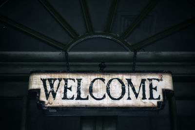 Low angle view of a welcome sign