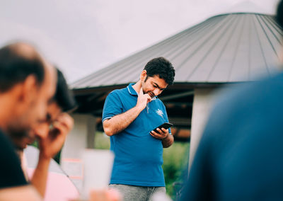 Young man using mobile phone