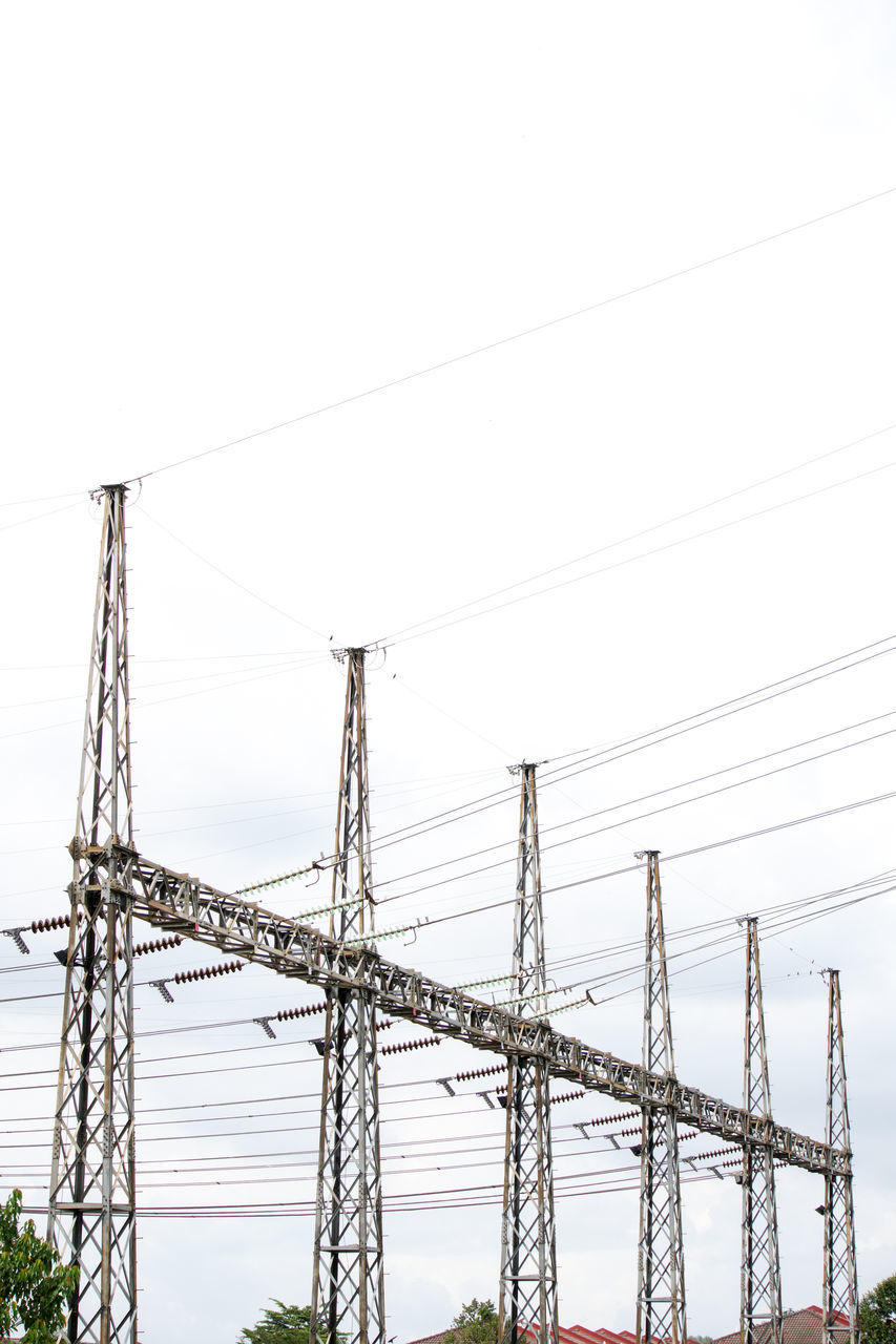 electricity, technology, electricity pylon, cable, power supply, power line, power generation, overhead power line, sky, transmission tower, tower, nature, no people, architecture, outdoor structure, built structure, industry, outdoors, environment, line, clear sky, business finance and industry, day, electrical supply, mast, outdoor power equipment, copy space, plant, landscape, communication, low angle view, metal, in a row