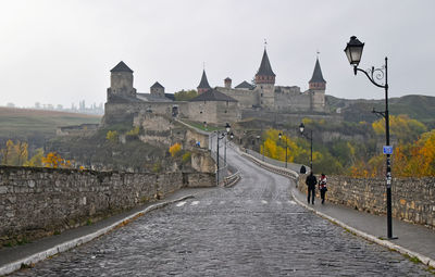 View of road along buildings