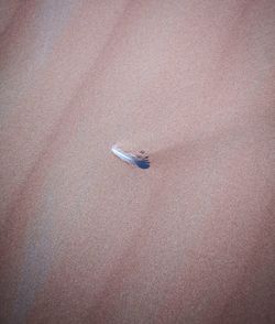 High angle view of small boat on beach