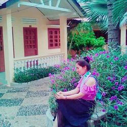 Woman with potted plants