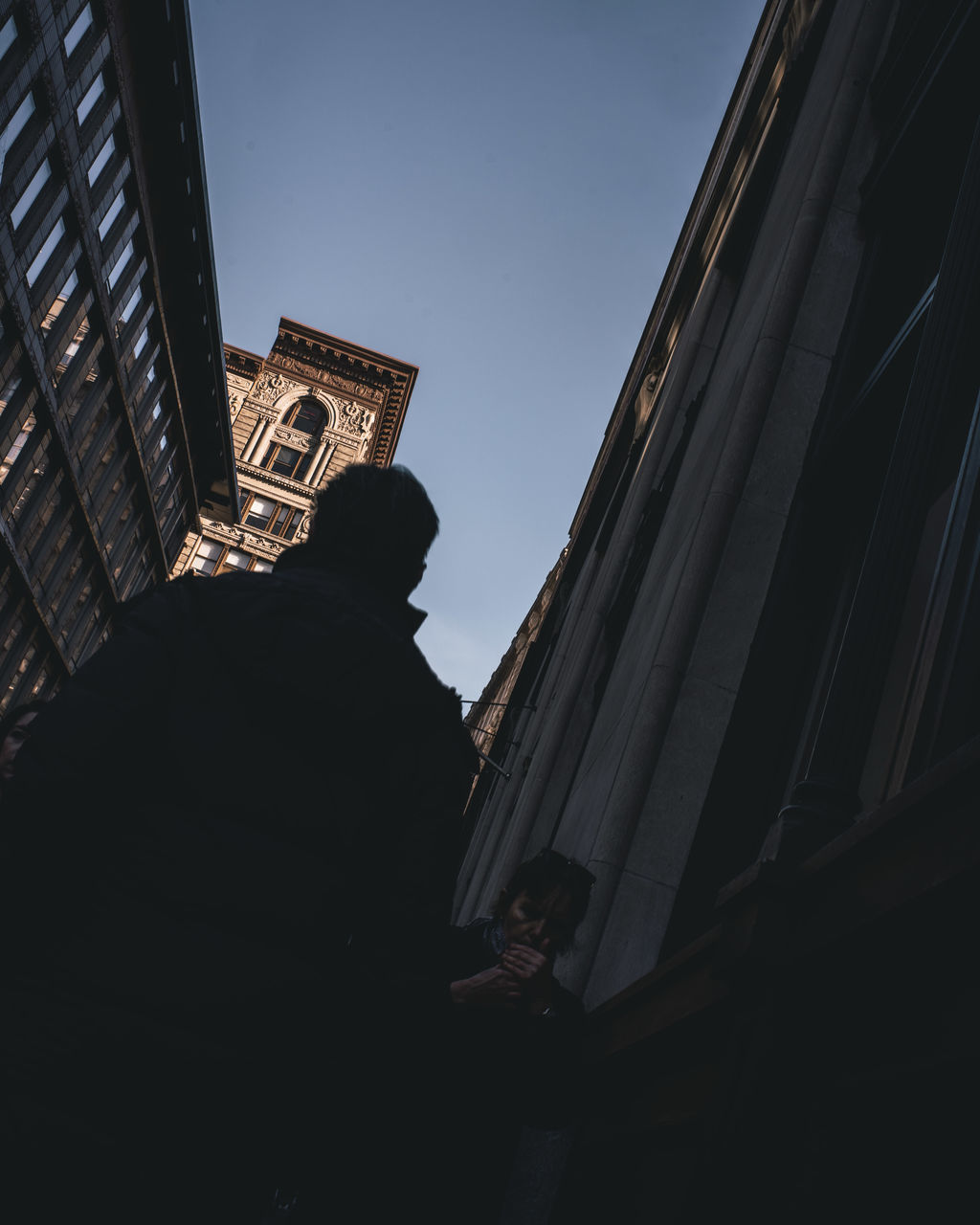 LOW ANGLE VIEW OF BUILDINGS AGAINST SKY