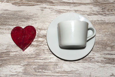 Directly above shot of coffee cup on table