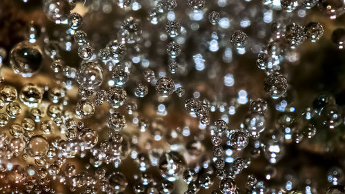 Full frame shot of wet glass during rainy season