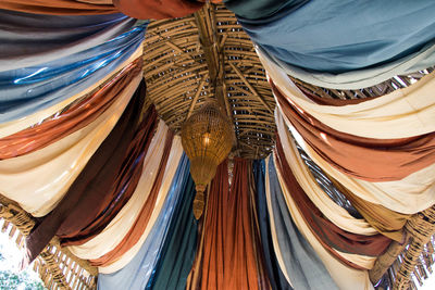 Low angle view of clothes hanging in temple