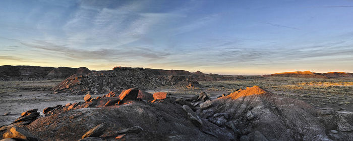 Scenic view of landscape against sky during sunset