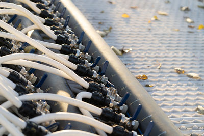 Preparing ice skating rink for outdoor activities pipelines for filling arena with water from hose