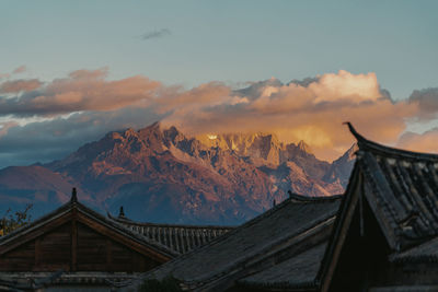 Scenic view of mountains against sky during sunset