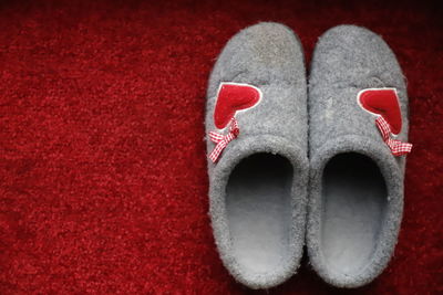 Close-up of shoe on doormat