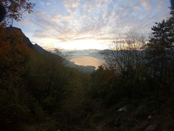 Scenic view of landscape against sky during sunset