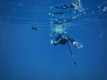 Close-up of man swimming in sea