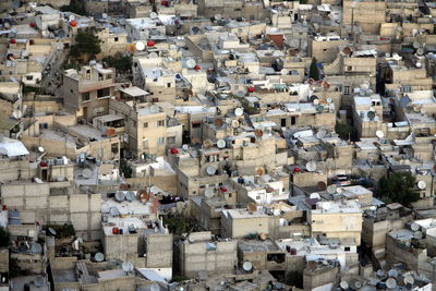 Full frame shot of buildings with satellite dishes on terraces