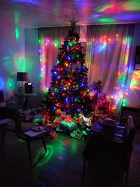 Illuminated christmas tree at night