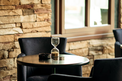 Hourglass on table at restaurant