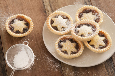 High angle view of pies in plate during christmas on table