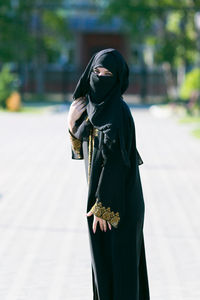 Rear view of person standing on street