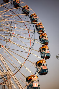 Closeup of multi-coloured giant wheel during dussehra mela in delhi, india. bottom view giant wheel