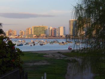 Scenic view of cityscape against sky during sunset