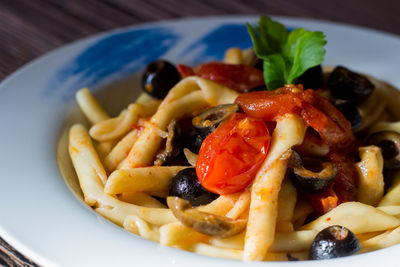 Close-up of pasta in plate on table