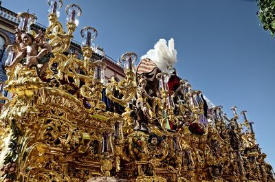 Low angle view of sculpture against sky