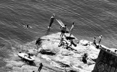 High angle view of people on boat at sea