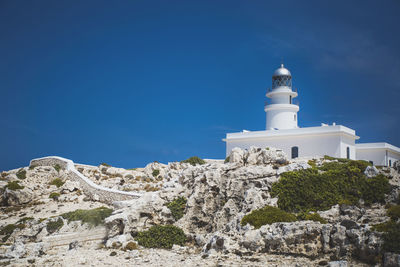 Low angle view of lighthouse against sky