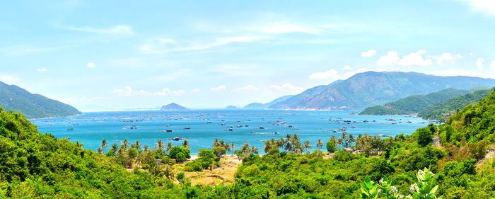 Scenic view of bay against sky