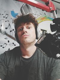 Portrait of young man sitting