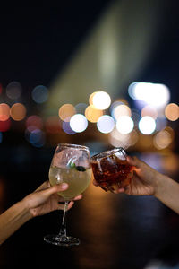 Close-up of hand holding wine glass