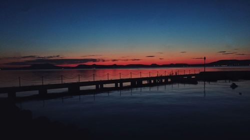 Scenic shot of pier over calm sea