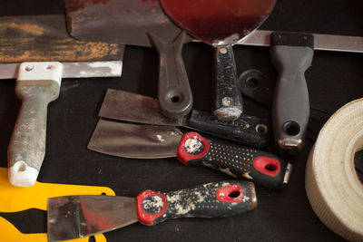 High angle view of various objects on table