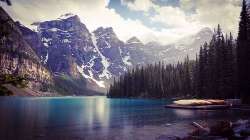 Scenic view of lake with mountains in background