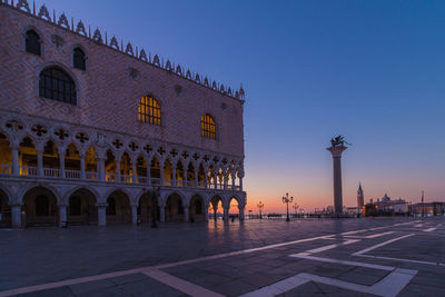 View of building against clear sky during sunset