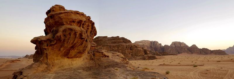 Rock formations on mountain against sky