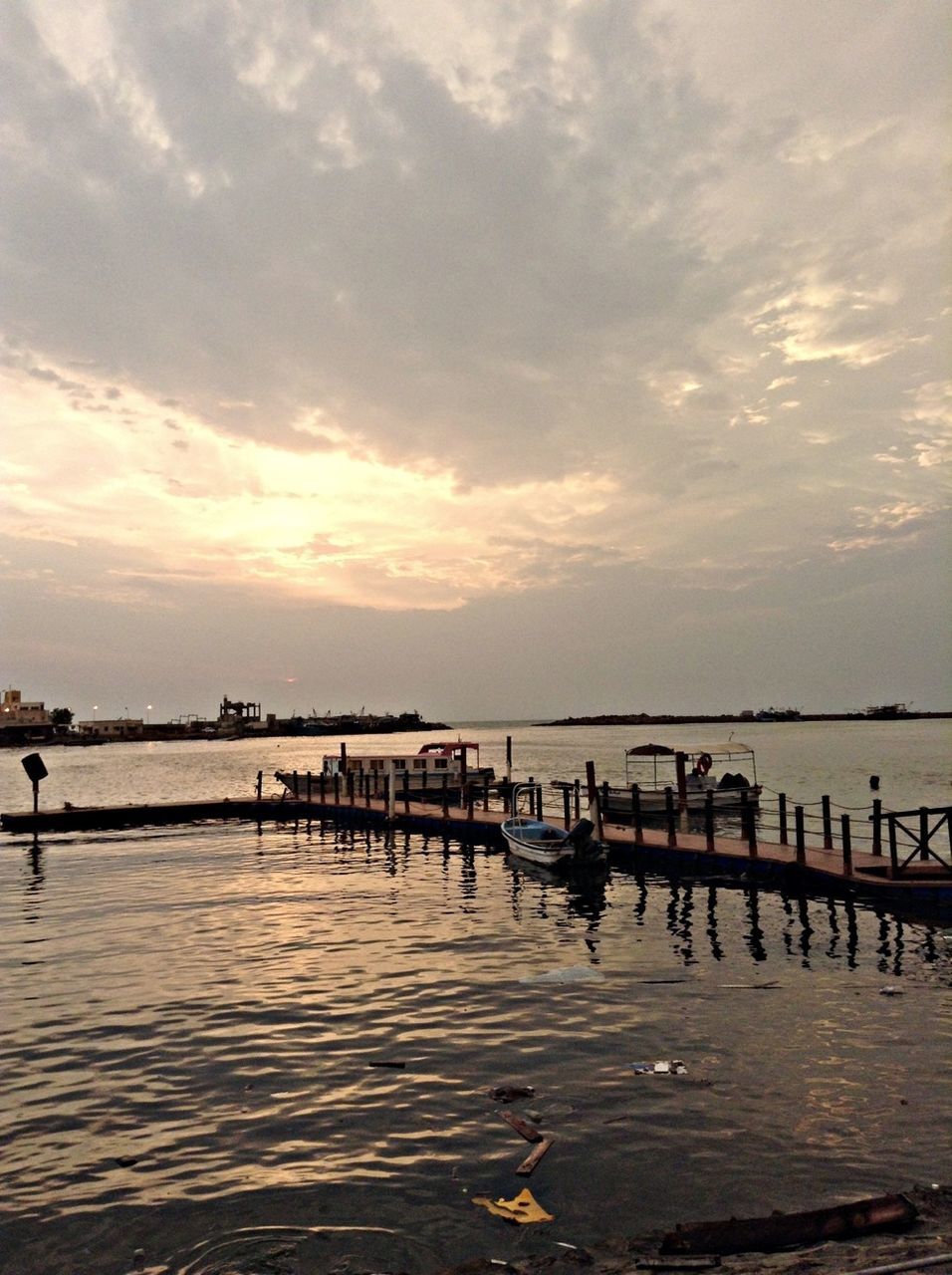 water, sky, sea, pier, cloud - sky, tranquil scene, scenics, tranquility, beauty in nature, silhouette, nature, sunset, cloud, cloudy, idyllic, waterfront, men, leisure activity, rippled