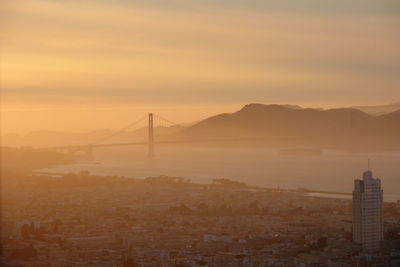 View of suspension bridge during sunset