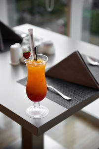 Close-up of beer in glass on table