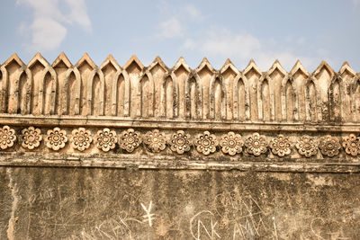 Low angle view of old building against sky