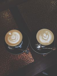 Close-up of cappuccino on table